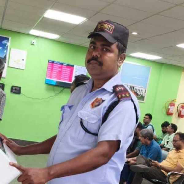 Security guard monitoring CCTV
